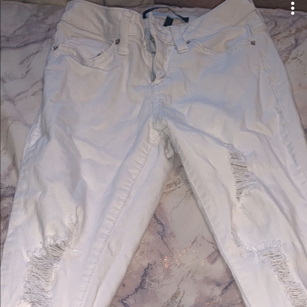 White ripped jeans